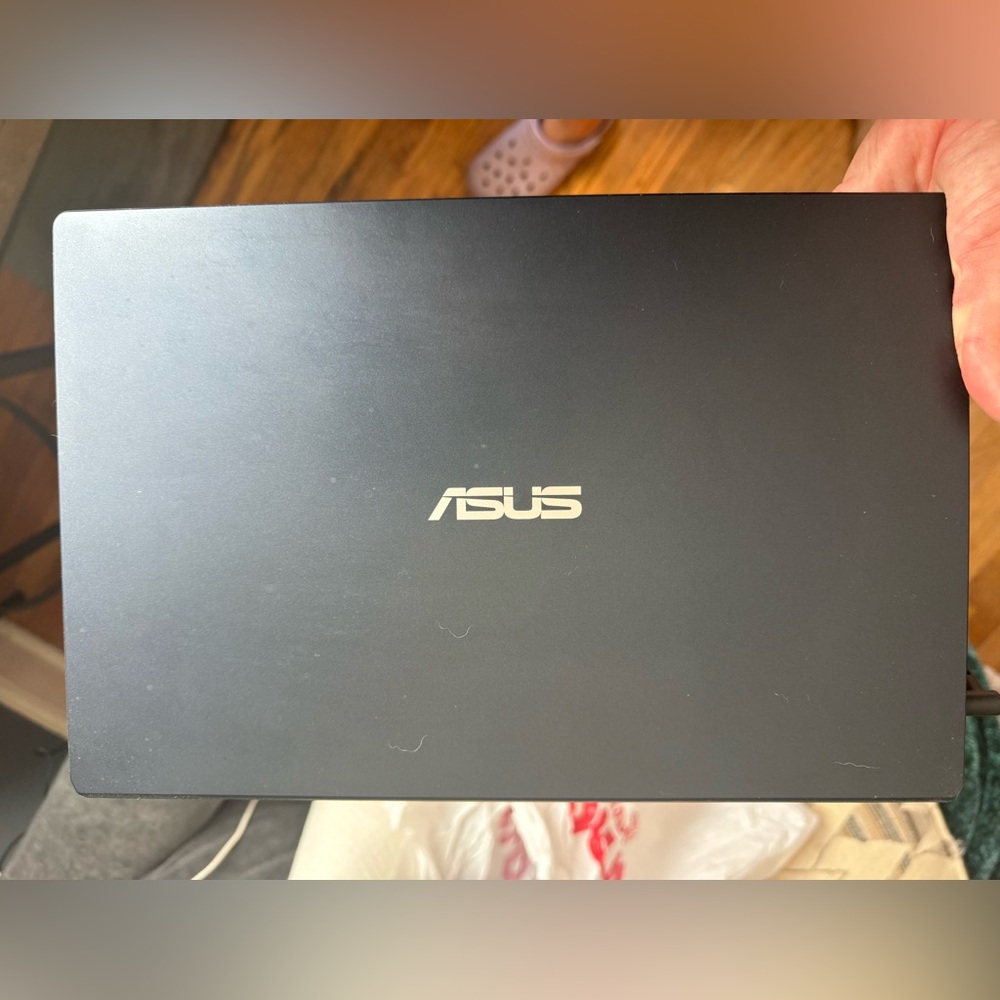 ASUS Black Laptop with Gold Logo